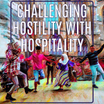 People dancing together beneath a sign saying "Challenging hostility with hospitality"